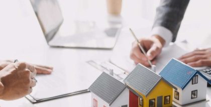 House models with documents for tenancy agreement.