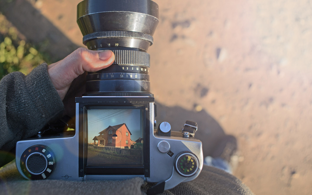 becoming a real estate photographer is also among the real estate side hustle ideas