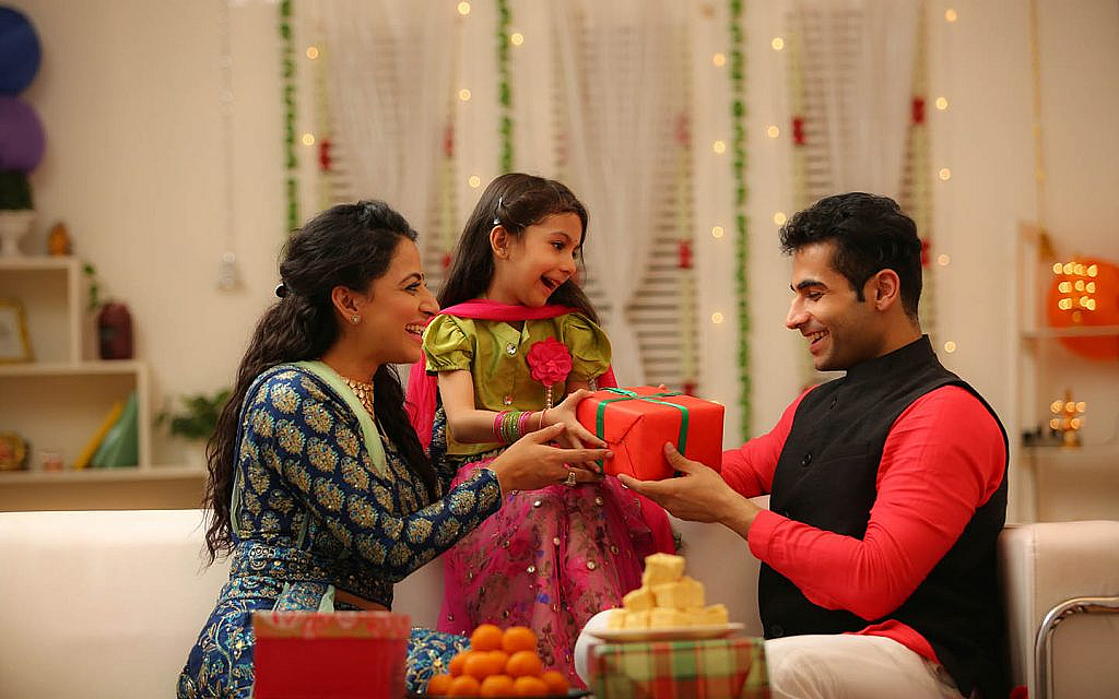 A children getting gift on Diwali celebrations