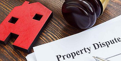 resolving real estate dispute in Ajman
