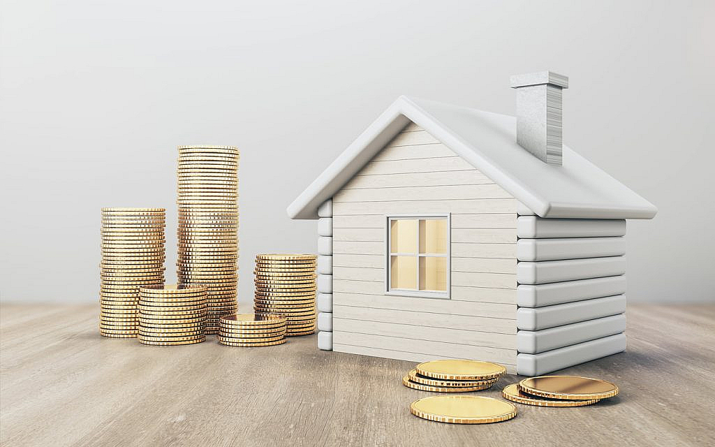 Ajman property ownership laws and fees