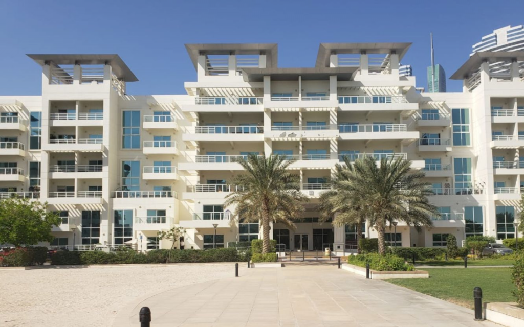 A mid-rise building in Cluster D featuring luxury apartments