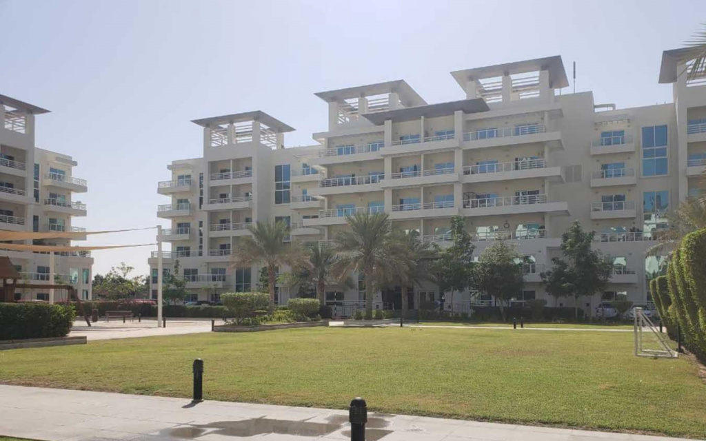 mid-rise building in Cluster A with a garden 