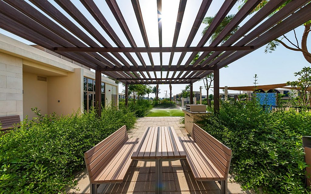 list of green communities to buy a property in Dubai includes Dubai Hills Estate