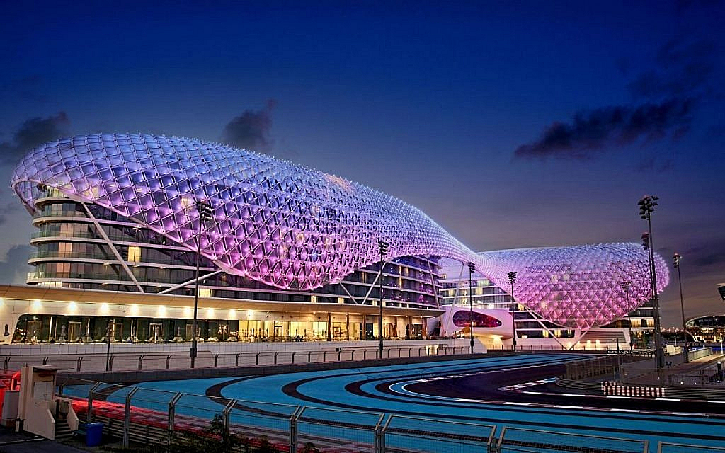 Night view of Yas Marina Circuit showing track and building 