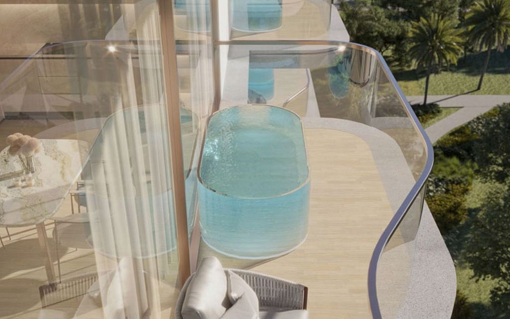 Flow Residence pool terrace with a green view