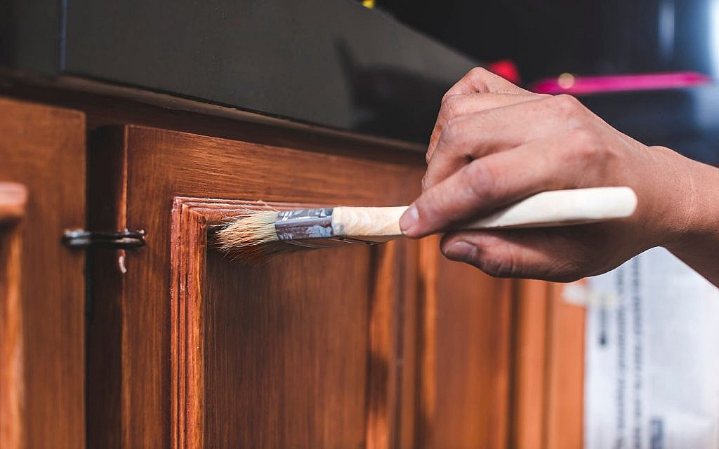 Painting your kitchen cabinets is the easiest DIY way to refresh your kitchen.