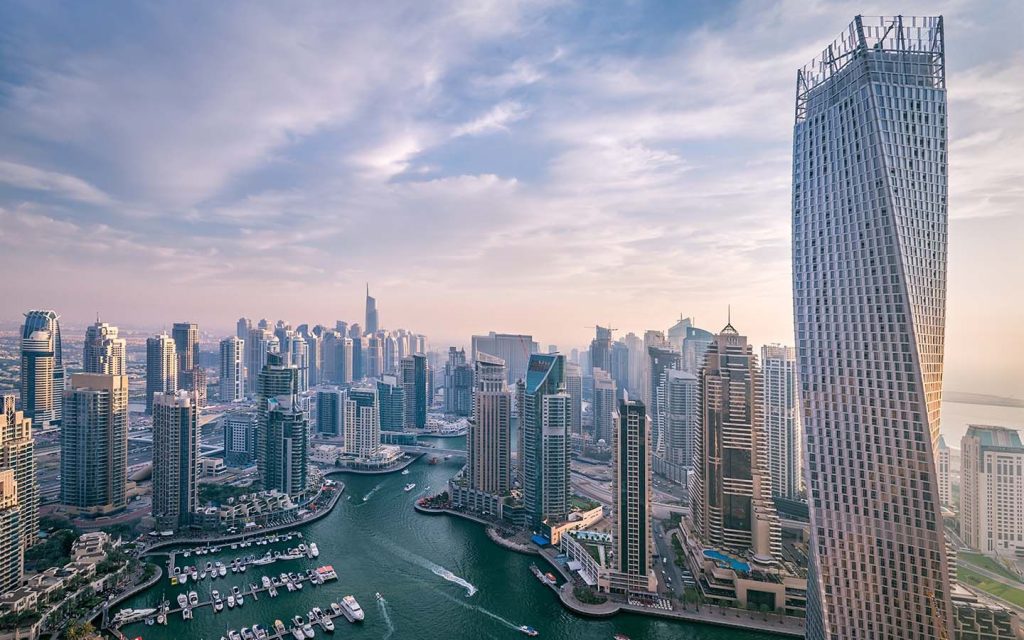 Aerial view of the Dubai Marina surrounded by buildings