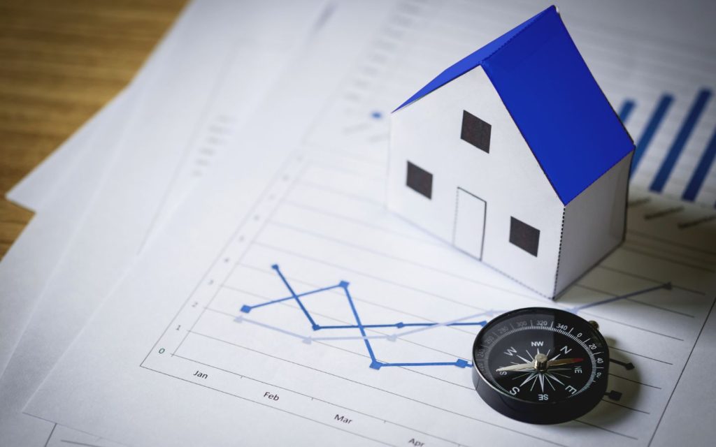 Real estate business risk shown on paper