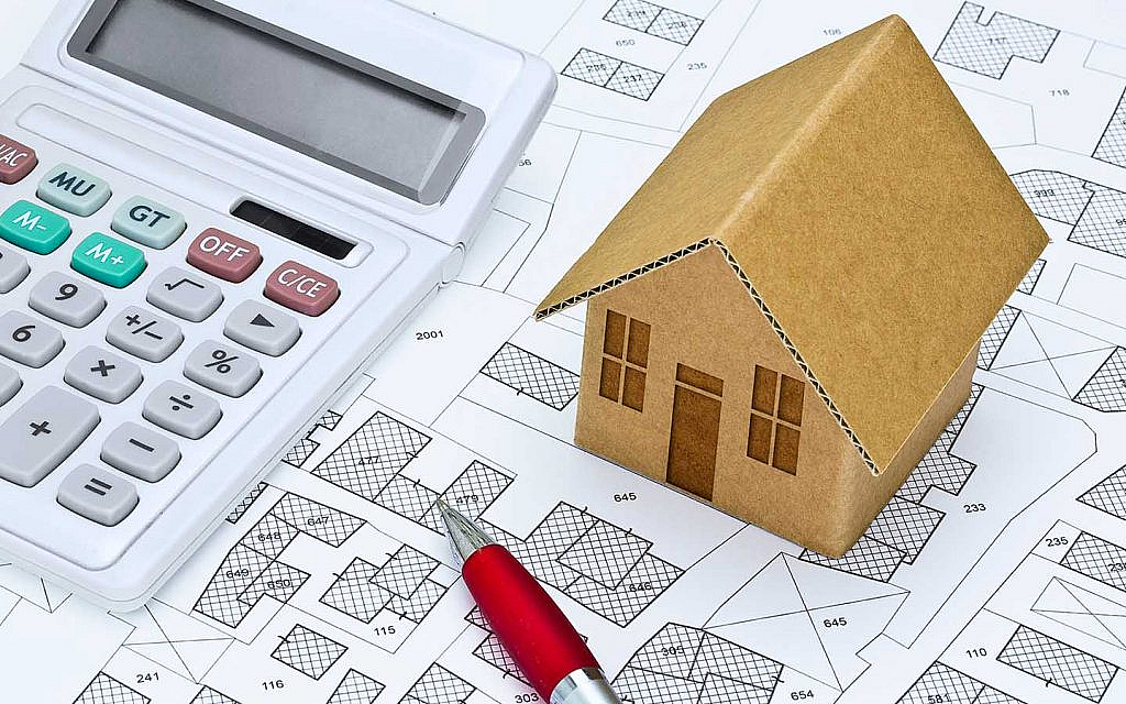 مجسم منزل يوضح عقارات الملكية المشتركة في دبي