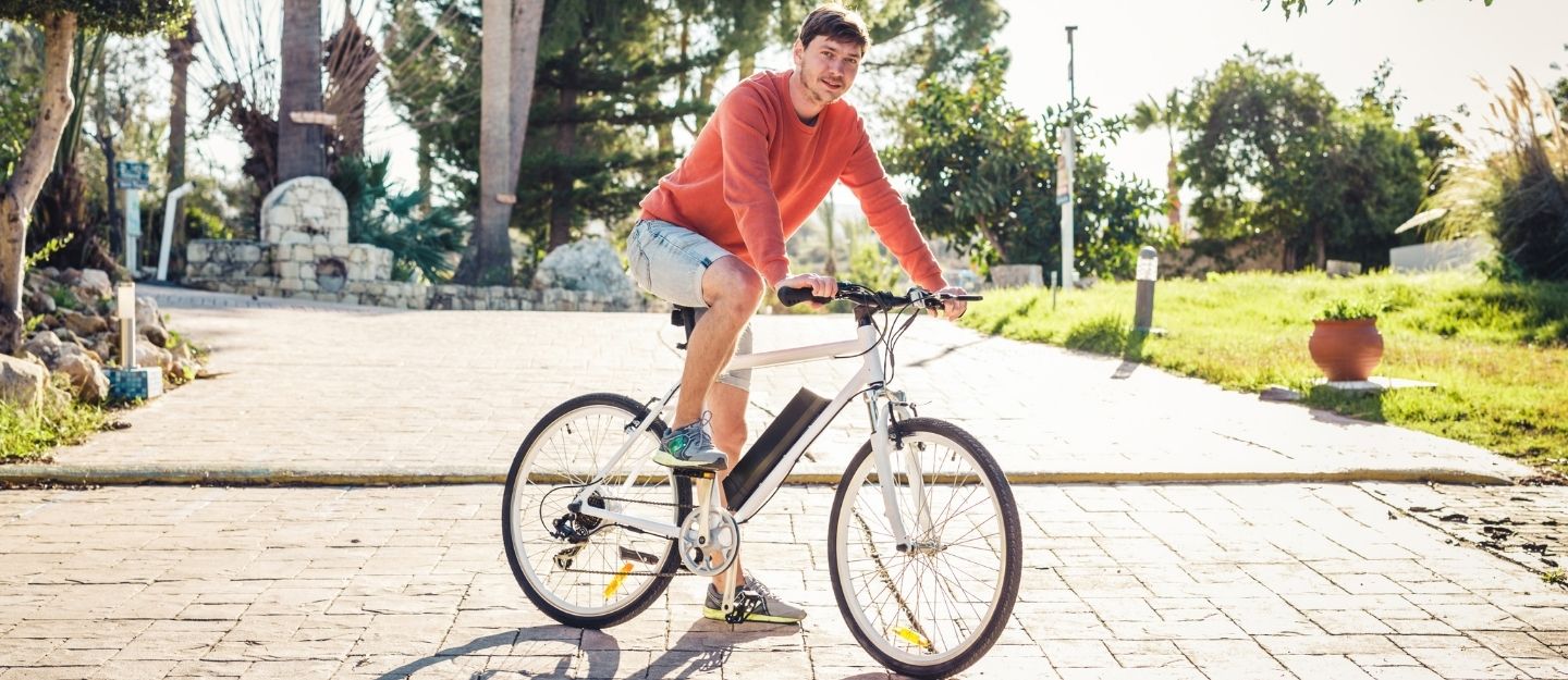 Person on cycle depicting concept of 15 minute city
