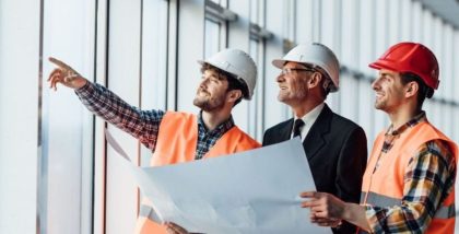 Construction workers discussing a project