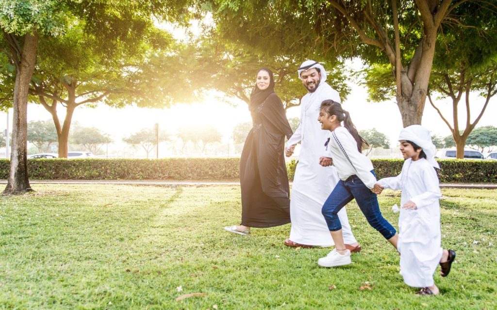 Family enjoying in a park in Dubai