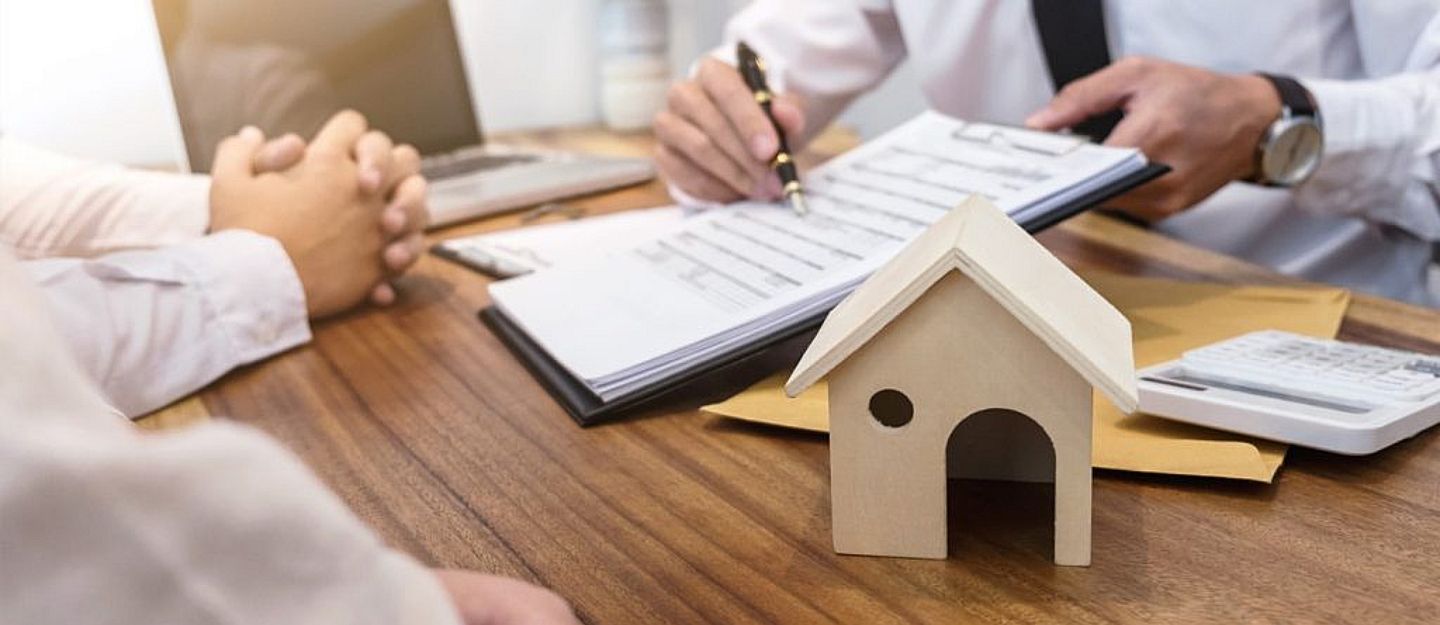 a person registering a property unit in Ras Al Khaimah