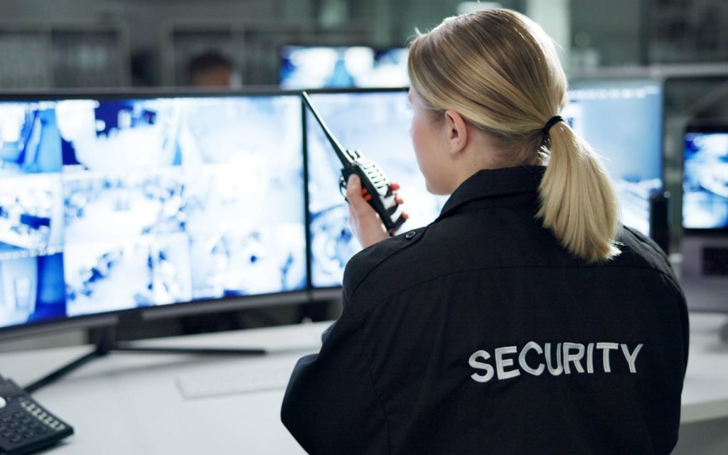 The back of a security officer.
