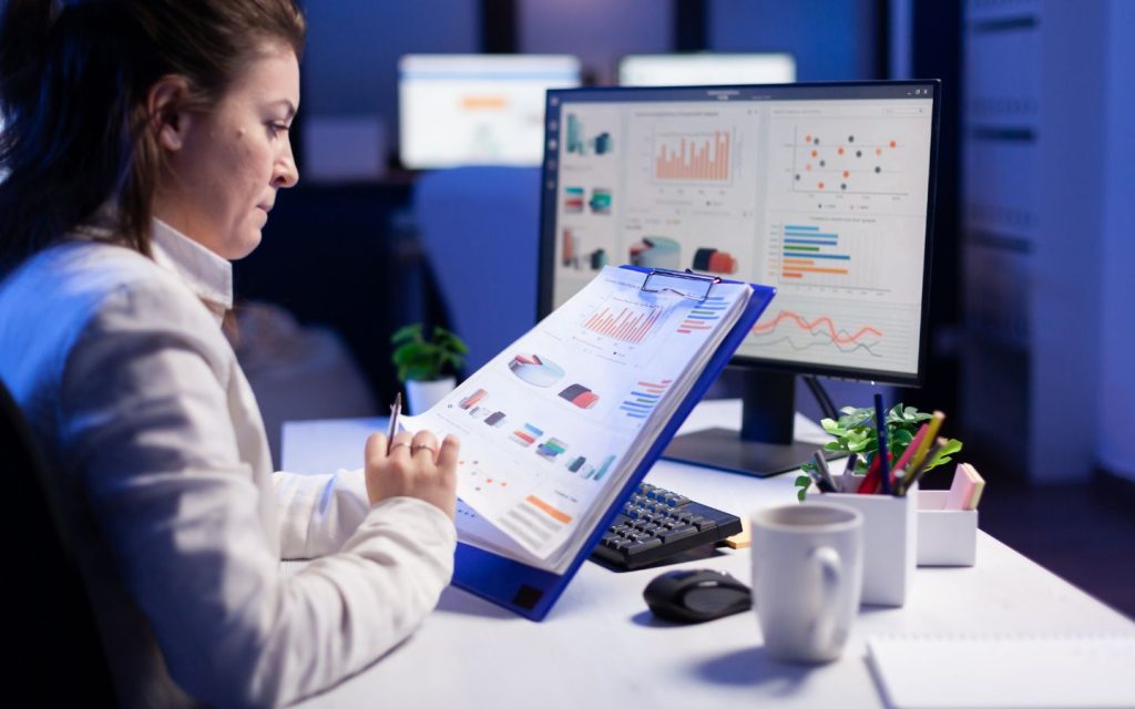 Real estate agent checking the sales funnel of a CRM
