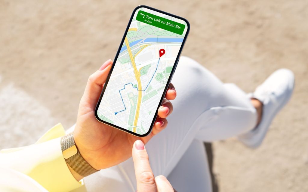 A person using Google Maps on a phone.
