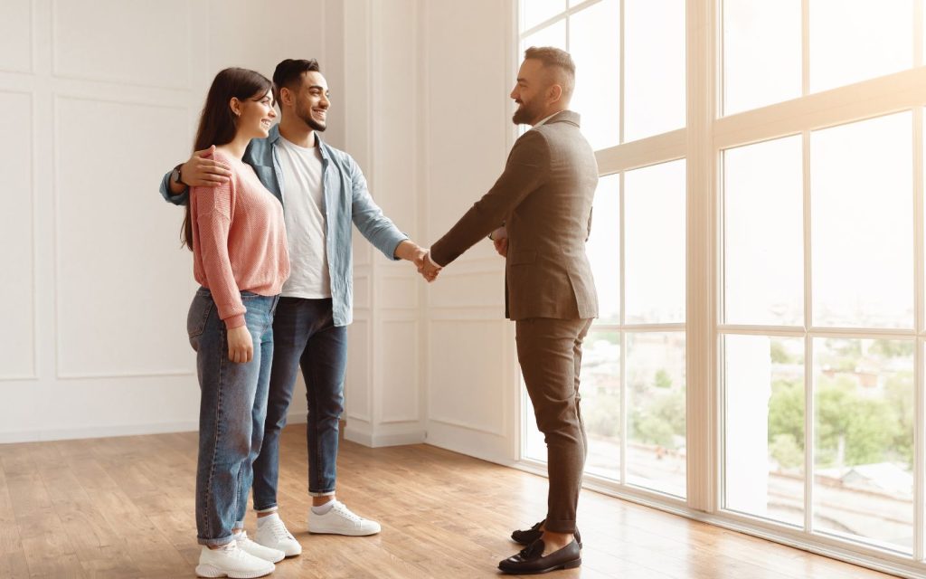 Man meeting co-owners of a fractional property