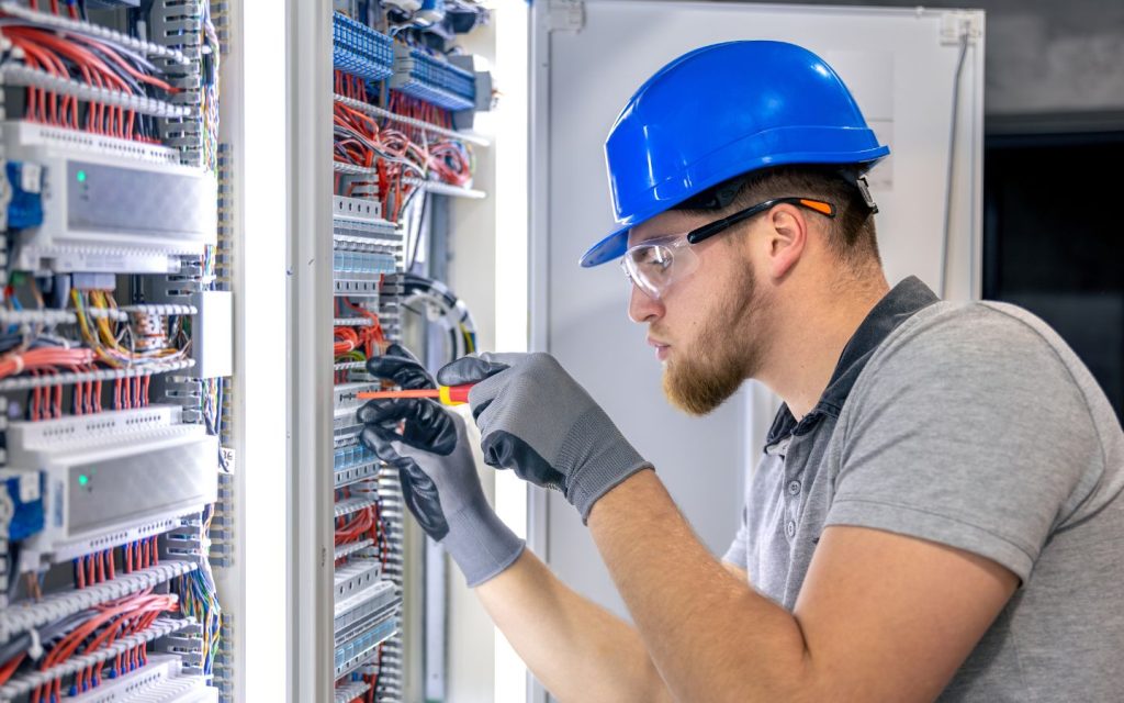 trained staff installing a power line