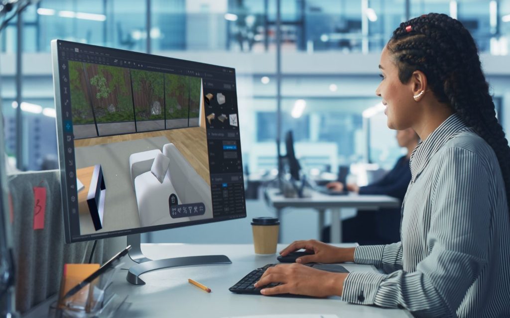 Interior designer in Ajman working on a digital map